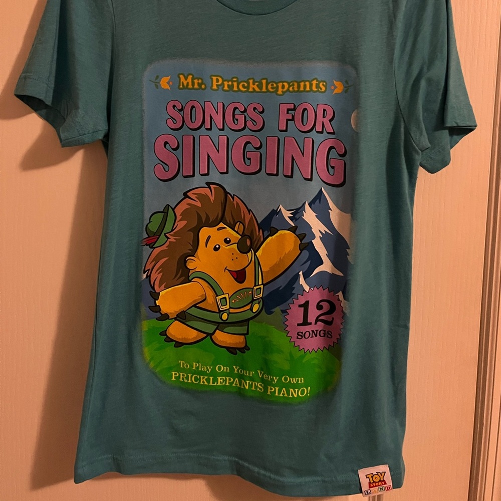 Light Blue Toy Story Land shirt. Size S